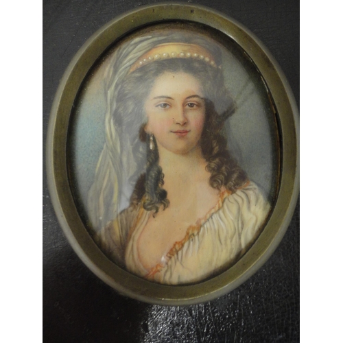 422 - Regency portrait miniature of a young woman, oil on card, 5.5cm x 7.5cm, contained in an ebonised fr... 