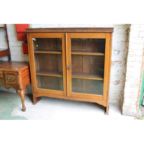 609 - Oak glazed bookcase.