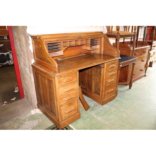 621 - Oak roll top desk, requires fixed assembly.