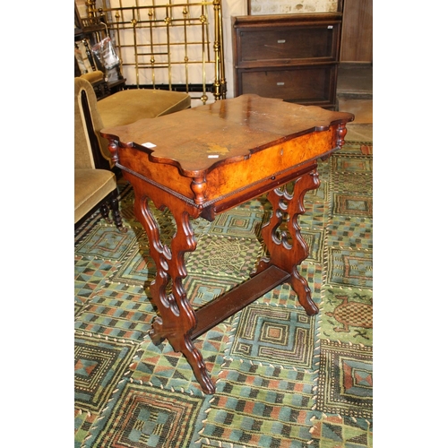 622 - Victorian walnut games table.