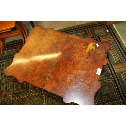 622 - Victorian walnut games table.