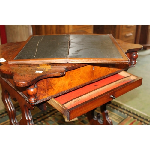 622 - Victorian walnut games table.