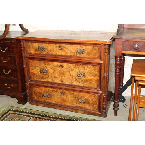 628 - 19th century walnut chest of three drawers.