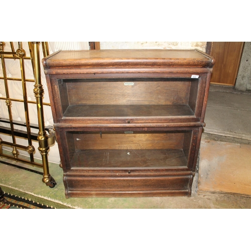 632 - Glazed Globe Wernicke sectional bookcase.