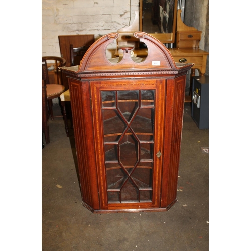 652 - Victorian mahogany and boxwood inlaid corner cabinet with astragal glazed front.