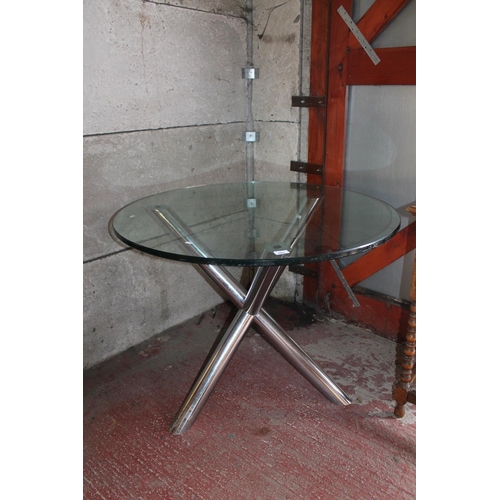 662 - Retro aluminium base and glass top dining table.