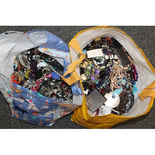 581 - Two large bags of costume jewellery