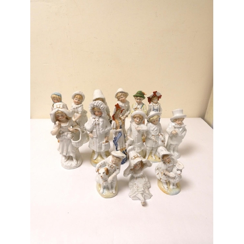 205 - Collection of continental figures, c.1900, modelled as assorted infants, mixed sizes. (15)