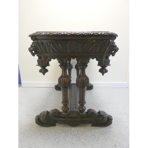 365 - Jacobean revival oak library table, the octagonal top with moulded decoration, above single drawer w... 