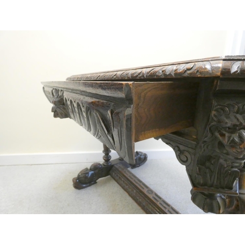 365 - Jacobean revival oak library table, the octagonal top with moulded decoration, above single drawer w... 