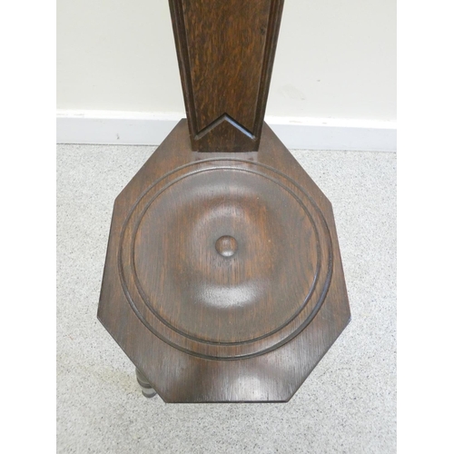 373 - 20th century dark oak spinning chair on bobbin turned supports. Height 92cm.