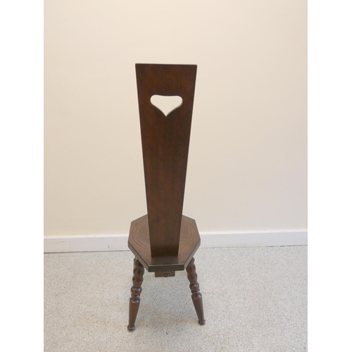 373 - 20th century dark oak spinning chair on bobbin turned supports. Height 92cm.