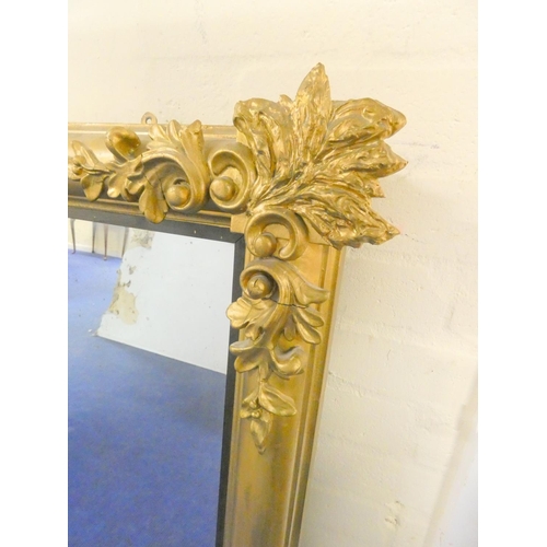 375 - Victorian gilt framed overmantel mirror the corners adorned with floriate scrolls along with applied... 