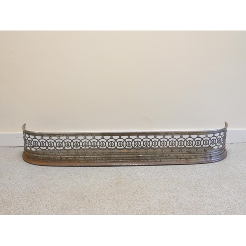 378 - 19th century Regency period pierced steel fire fender. Width 120cm, Height 18cm.