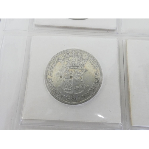 269 - United Kingdom. Folder to include a collection of .500 grade pre-1947 coins to include a 1952 South ... 