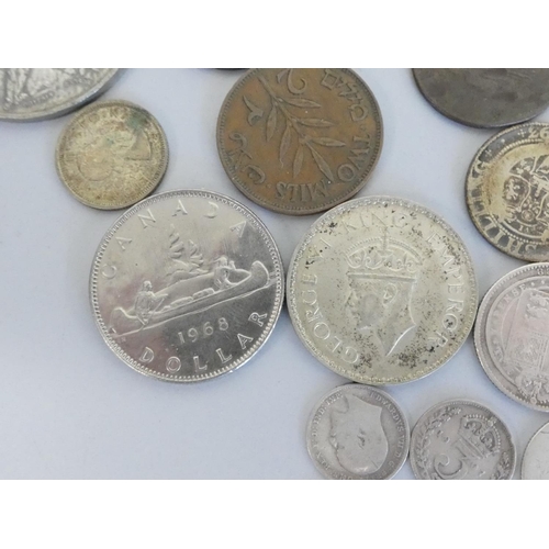 258 - Collection of silver and world coins to include a 1968 Canada dollar, 1946 halfcrown (EF), USA 1831 ... 