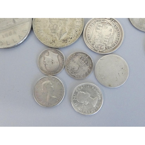 258 - Collection of silver and world coins to include a 1968 Canada dollar, 1946 halfcrown (EF), USA 1831 ... 