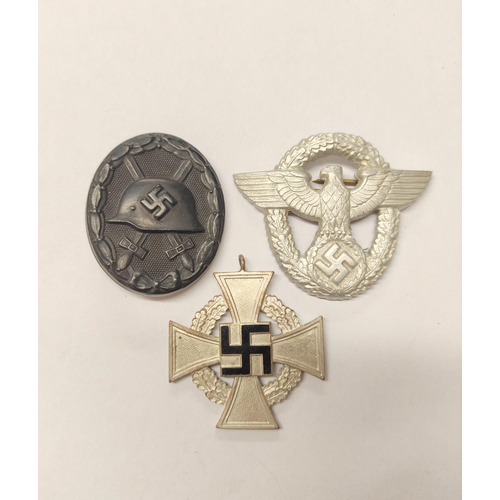 291 - Germany Third Reich: Awards to include a 1939 Wound Badge, Military Police Cap Badge, and 25 years F... 