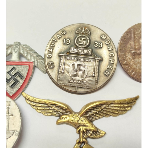 292 - Germany Third Reich: Awards to include a 1933 Munich Gautag, 1936 Labour Day badge, Labour Corps cap... 