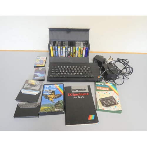 108 - Sinclair ZX Spectrum gaming console along with a selection of games. 