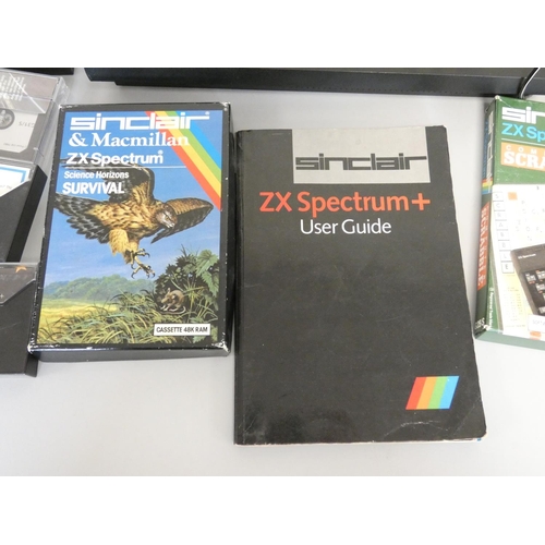 108 - Sinclair ZX Spectrum gaming console along with a selection of games. 