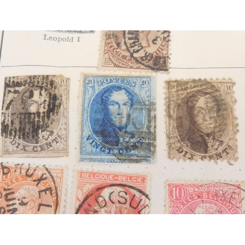 363 - Album of British and World postage stamps to include an imperforated two penny blue (plate letters N... 