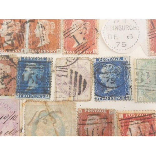 363 - Album of British and World postage stamps to include an imperforated two penny blue (plate letters N... 