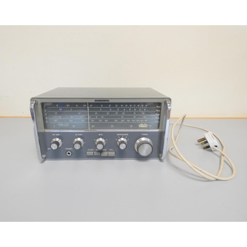 406 - Eddystone - An Eddystone EC10 radio receiver in grey case with five dials to front and headphones po... 