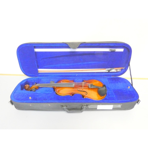 413 - Contemporary 3/4 violin by Antoni, spruce top with one piece maple back. With case and bow.