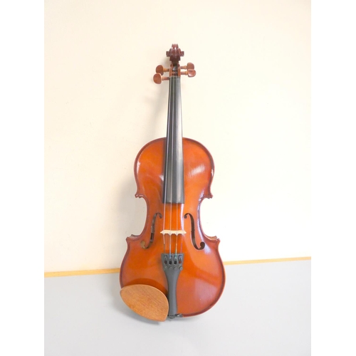 415 - Contemporary 3/4 violin by Primavera, spruce top with two piece maple back. With case and bow.