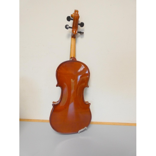 424 - 1/4 scale violin by Primavera, spruce top with two piece maple back. With case and bow.