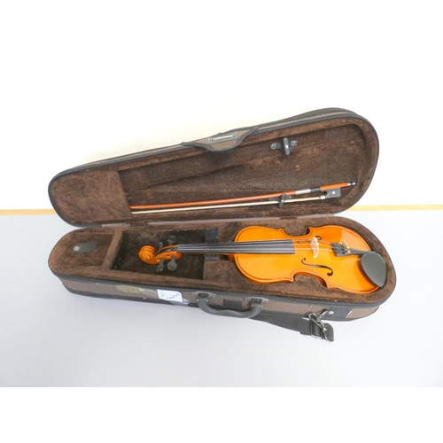 425 - 1/8 scale student violin by Stentor, spruce top with two piece maple back. With case and bow.