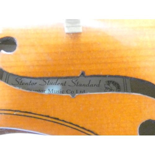 425 - 1/8 scale student violin by Stentor, spruce top with two piece maple back. With case and bow.