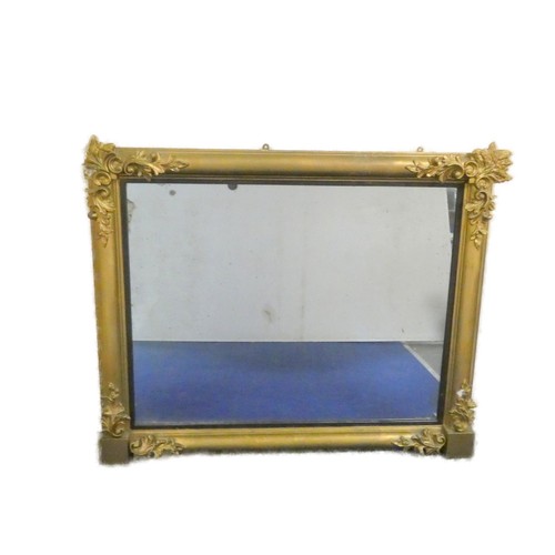 375 - Victorian gilt framed overmantel mirror the corners adorned with floriate scrolls along with applied... 