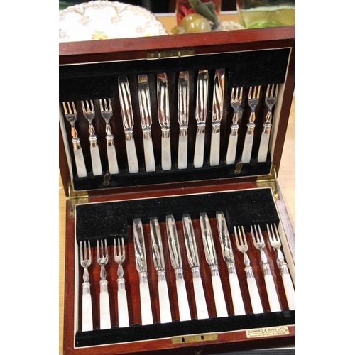 180 - Cased set of mother-of-pearl starter forks and knives.