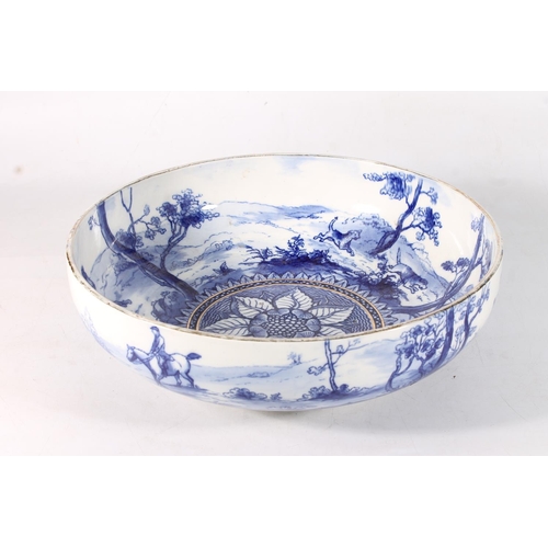 176 - Royal Doulton blue and white bowl decorated with hunting scene.