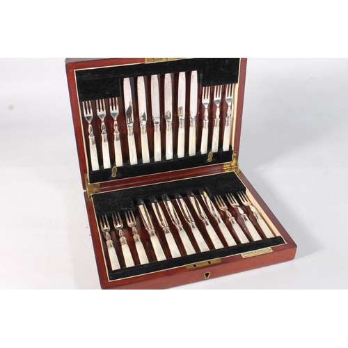 180 - Cased set of mother-of-pearl starter forks and knives.