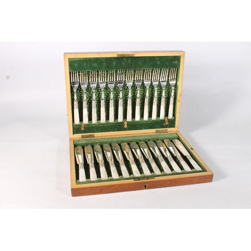 185 - Cased canteen of mother-of-pearl handled silver-plated fish knives and forks.