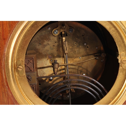 194 - Late Victorian mahogany mantel clock, inlaid with boxwood stringing, 29cm high.