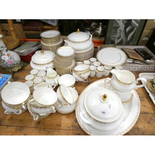 162 - Large Royal Doulton gold lace dinner service including tureens, plates, cups etc.