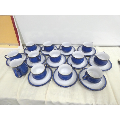 180 - Denby twelve place blue set of cups and saucers.