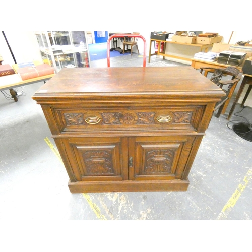 226 - Victorian carved oak secretaire chest revealing a fitted interior.