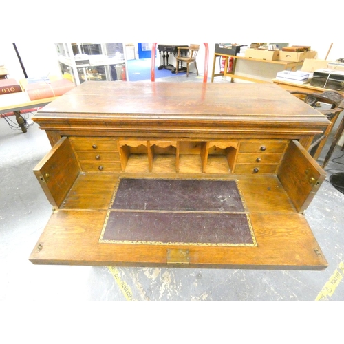 226 - Victorian carved oak secretaire chest revealing a fitted interior.