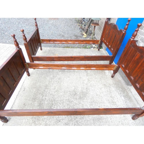 227 - Pair of pine single bed frames.