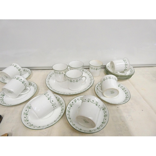 254 - E B Foley green and gilt tea set.