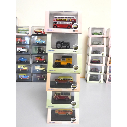 129 - Oxford Diecast Ltd. Box of 1:76 railway scale and other model vehicles to include Milk Float Co-Op 7... 