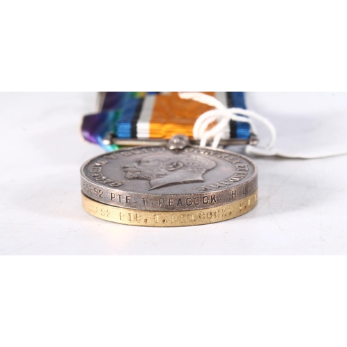 1351 - Medals of 55892 Private T Peacock of the Highland Light Infantry, comprising WWI war medal and victo... 