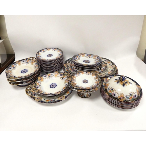 184 - Part Victorian pottery dinner service to include graduated platters, soup bowls, dinner plates etc.