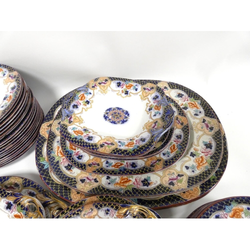 184 - Part Victorian pottery dinner service to include graduated platters, soup bowls, dinner plates etc.