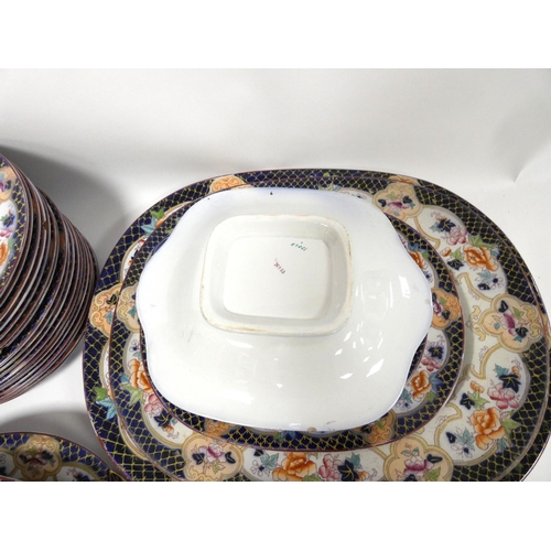 184 - Part Victorian pottery dinner service to include graduated platters, soup bowls, dinner plates etc.